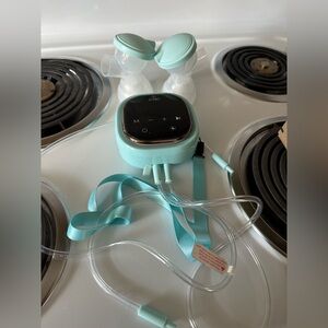 Zomee Z2 Portable Breast Pump - like new used. All sanitized.